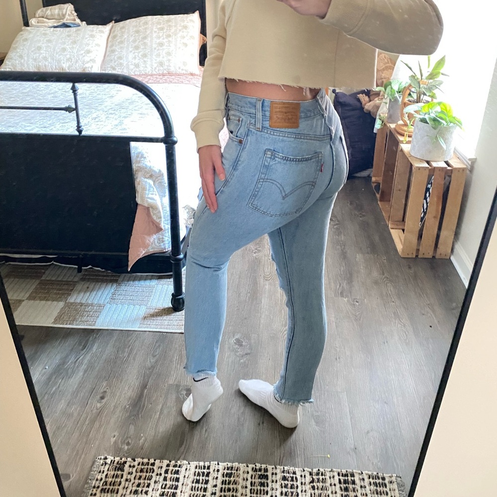 Levi Strauss Premium Light Wash High Waisted Distressed Mom Jeans — Women’s 28